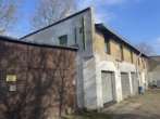 Bild - Mehrfamilienhaus mit 14 Garagen und Hofgebäude in Neumünster