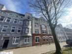 Bild - Mehrfamilienhaus mit 14 Garagen und Hofgebäude in Neumünster