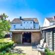 Modernisiertes Mehrfamilienwohnhaus mit 3 Wohnungen in Schwentinental bei Kiel - Gebäuderückfront Blick vom Garten